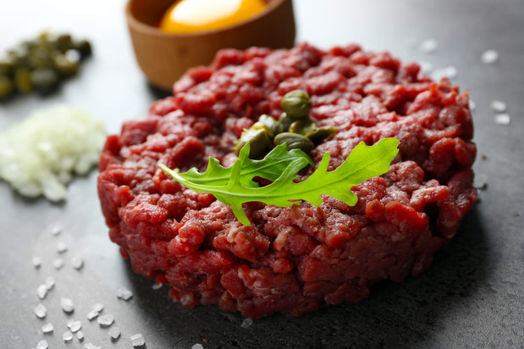 Fassona Tartare with delicate flakes of grana and rocket - 24 months ripened Parmigiano Reggiano Vacche Rosse